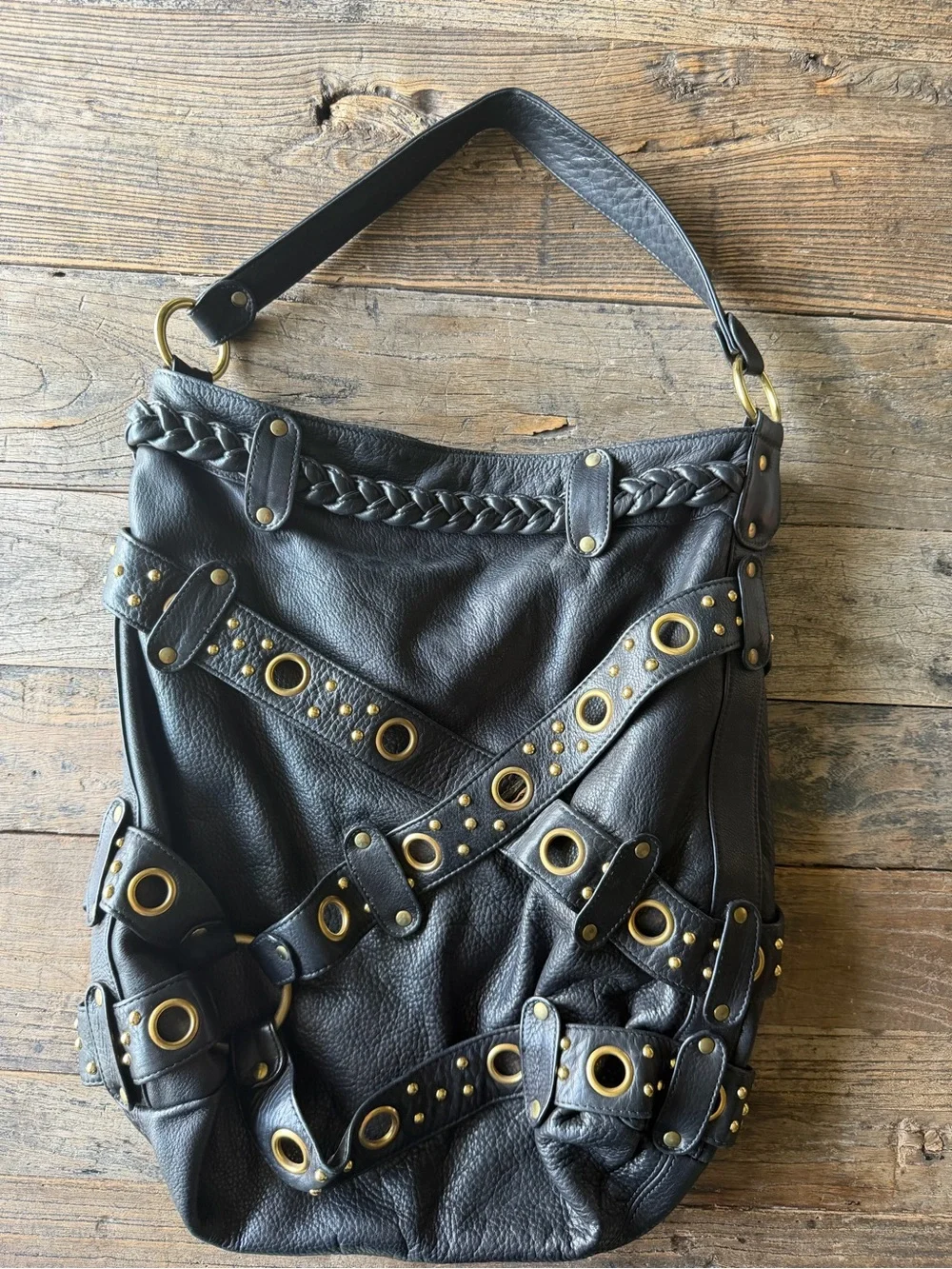 Black Leather Hobo Bag with Gold Grommet Detail